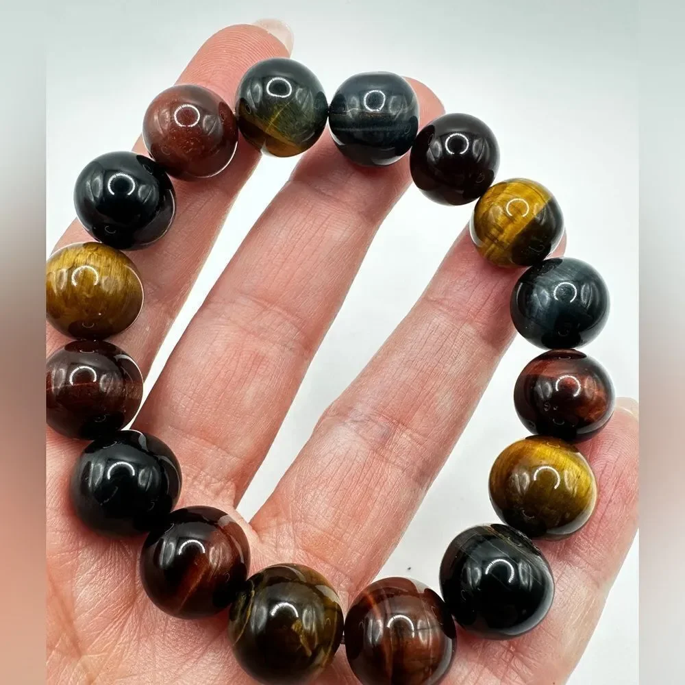 12mm red, black, blue, and yellow tigers eye stone stretchy bracelet!